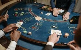 mufapp live-dealer studio with professional croupiers hosting blackjack and roulette tables